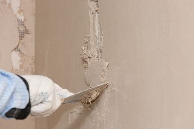 Handyman Painting a Wall